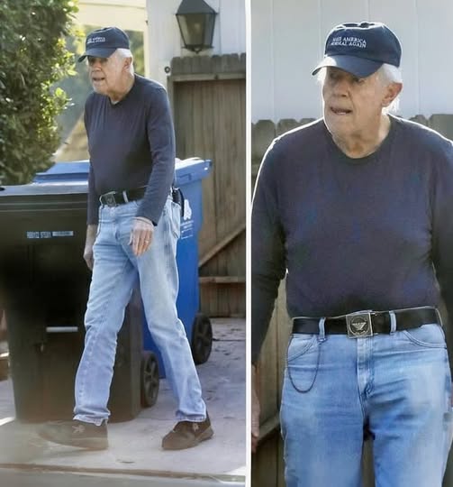 The former actor with a political message on his cap!👴🧢Once a famous TV star now looks unrecognizable doing yard work and taking out the trash.😯😱People don’t even recognize the ’70s sitcom star?🔍😐What about you – can you figure out who this man with a political message on his cap is?➡️🕵️‍♂️Learn his name and check more of his photos in the comment box below📸⬇️⬇️